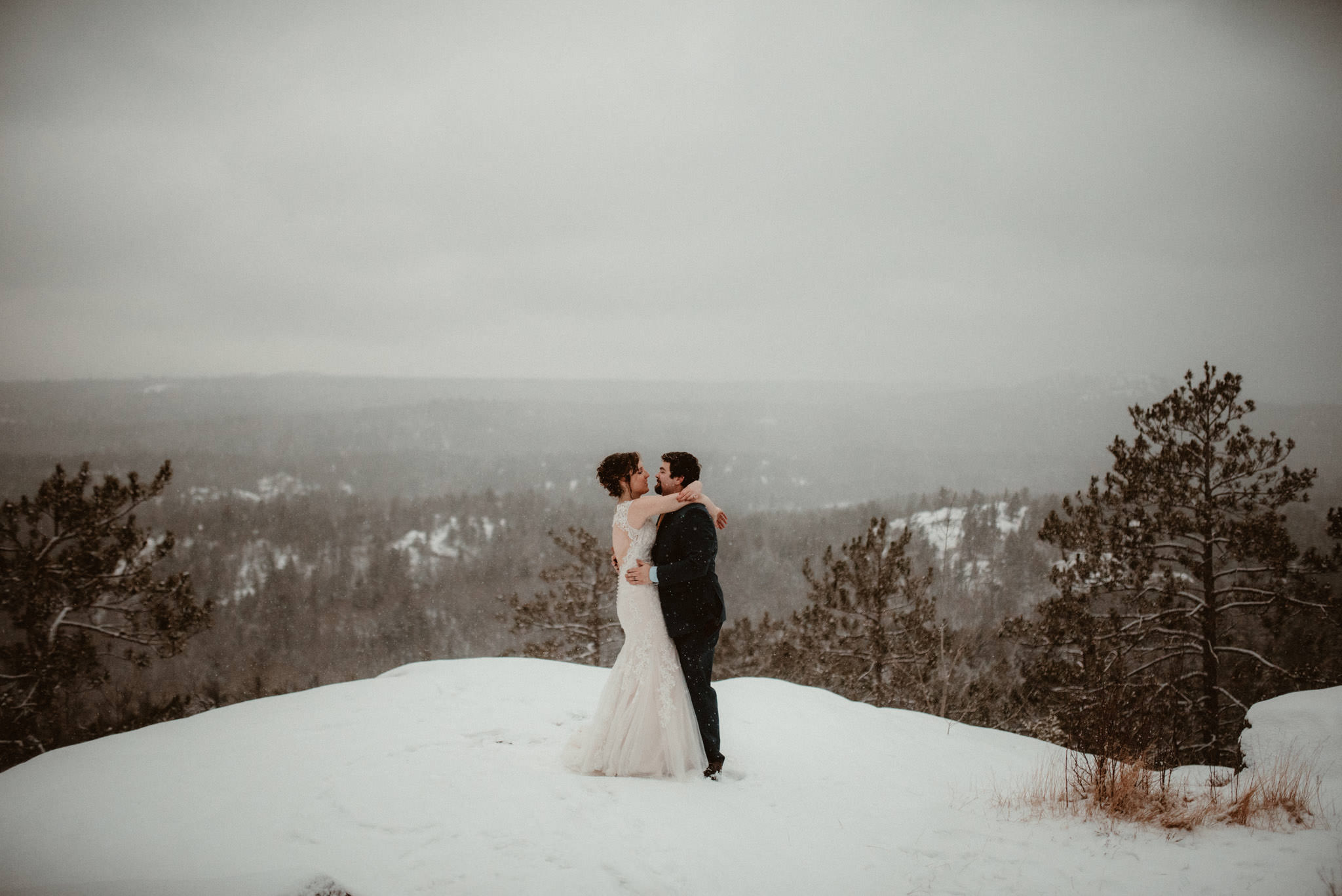 Elopement on Sugarloaf Mountain in Michigan in the snow