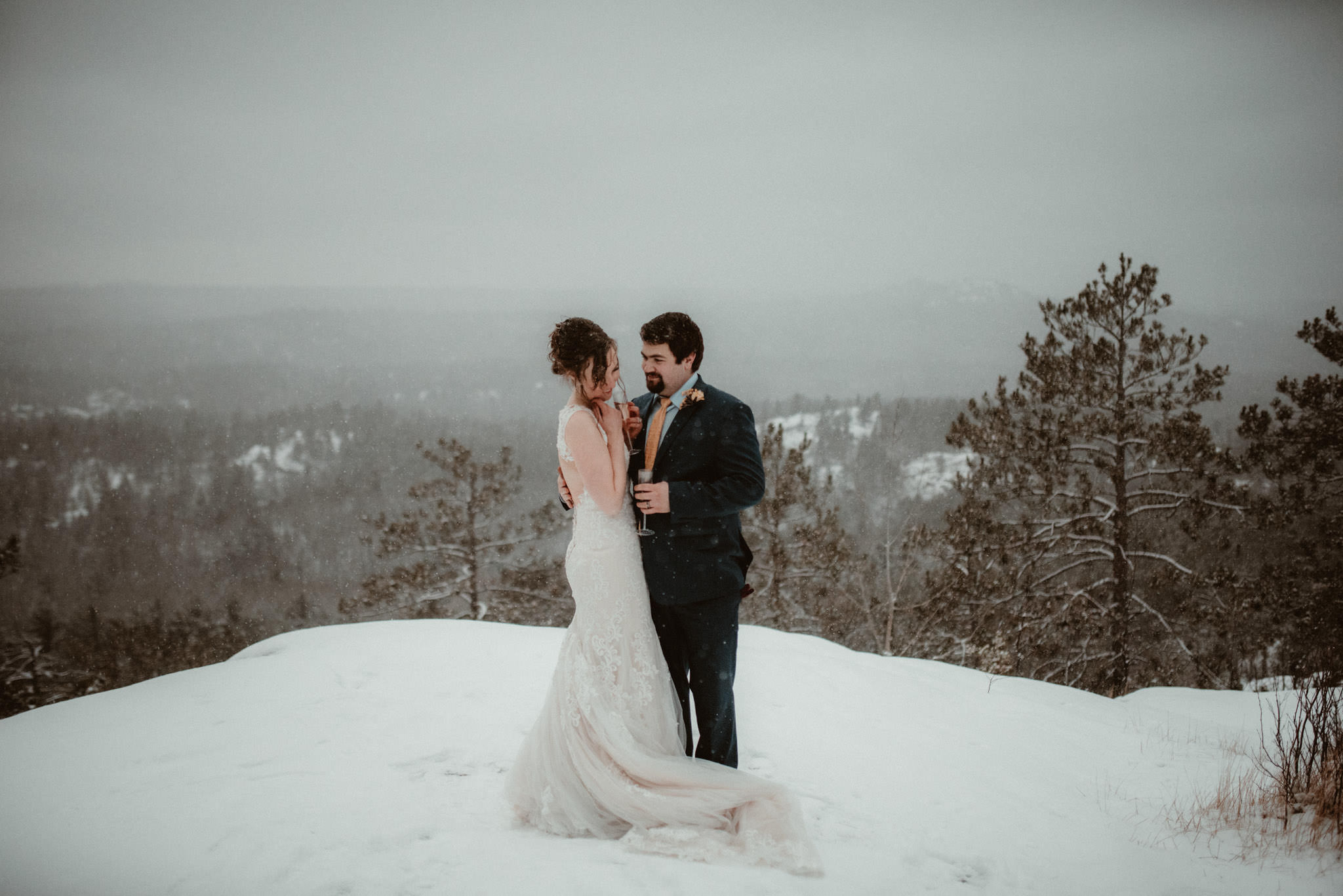 Elopement on Sugarloaf Mountain in Michigan in the snow