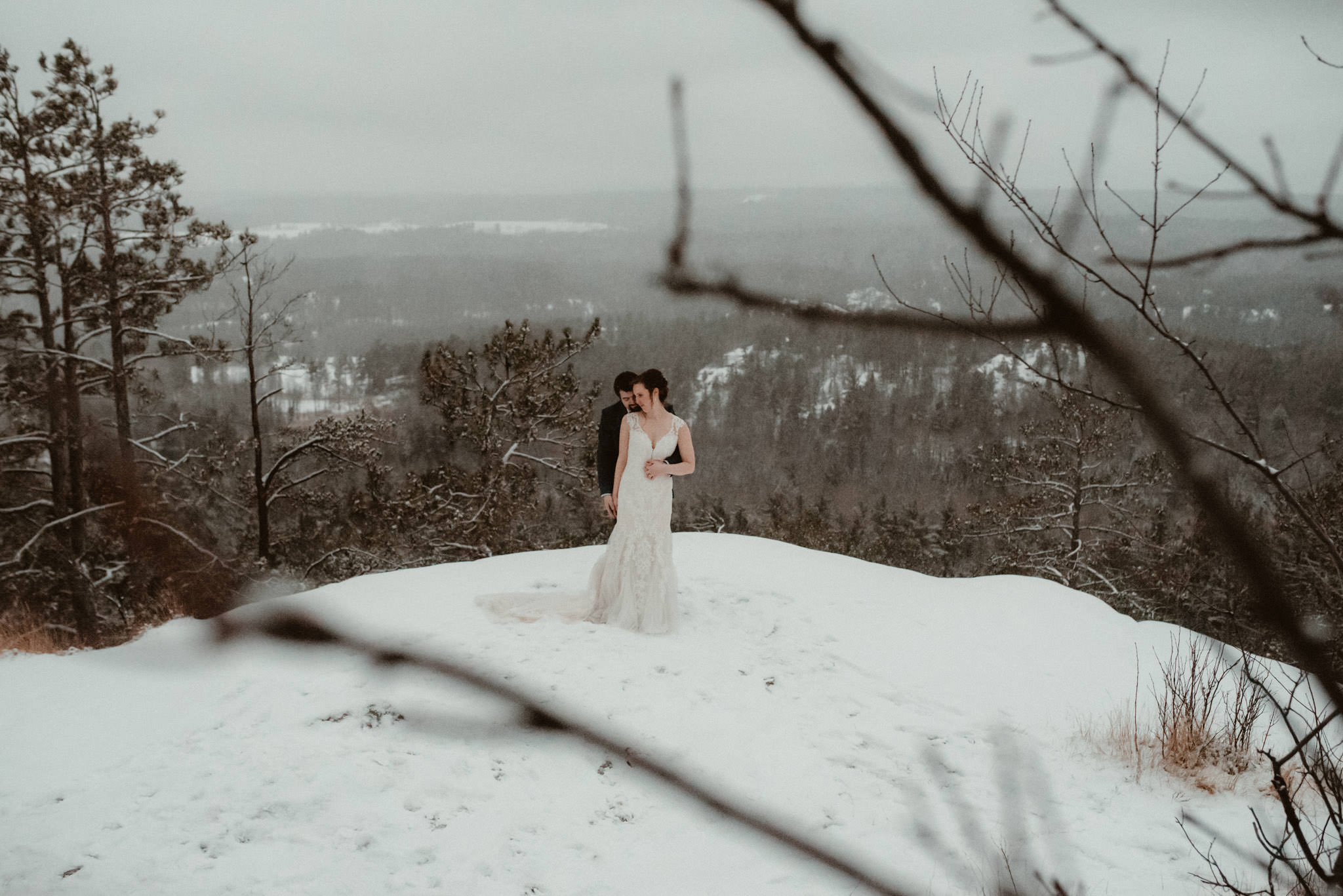 Elopement on Sugarloaf Mountain in Michigan in the snow